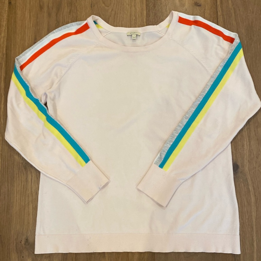 Light weight pink sweater with colorful stripes on sleeves